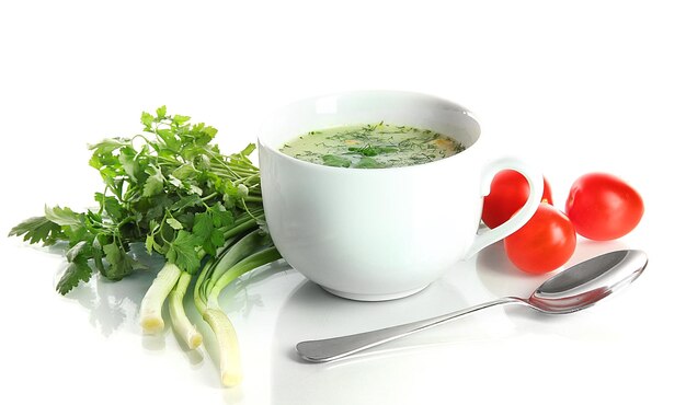 Bowl of soup with herbs
